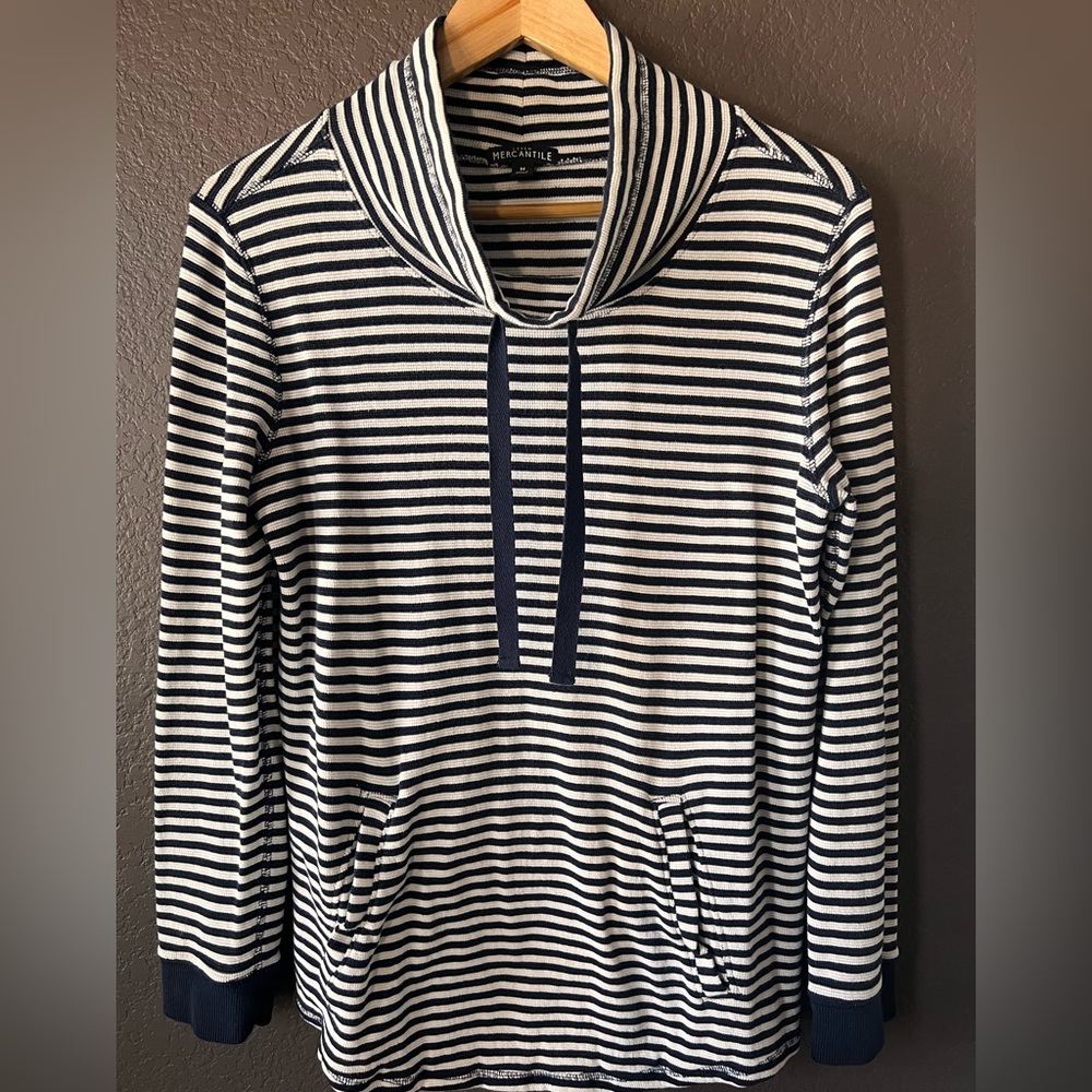 Woman’s navy and white long crown neck sweater